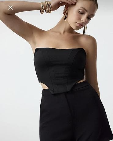 Digər tibbi məhsullar: Qara strapless korset top L olcu bir defe geyilib — 1