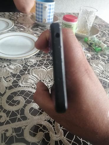 3 birinde printer: Poco M5, 64 GB, rəng - Qara, Barmaq izi, Face ID — 4