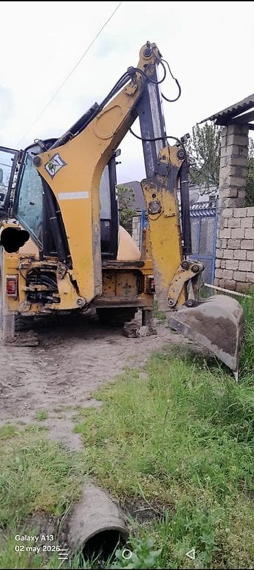 Ekskavator-yükləyici xidmətləri Cat 428E - Universal JCB/CAT tipli