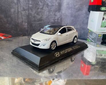 maşın modeli: Коллекционная модель Hyundai i30 5 door white 2012 Pino B&D Scale — 11