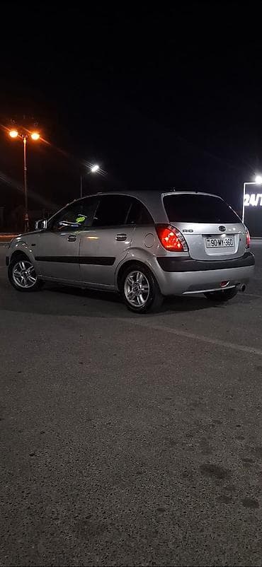 prius qapi: Kia Rio: 1.4 l | 2006 il Hetçbek — 2