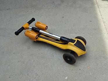 dort teker motor: Uşaq skuterı – 3 təkərli, sarı-qara rəngdə Xüsusiyyətlər: - 3 təkərli — 5