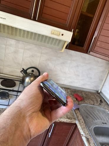 ipone x: IPhone X, 64 GB, Qara, Face ID — 6