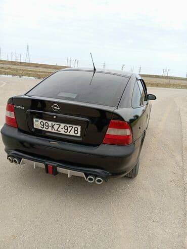 qubada ucuz avtomabiller: Opel Vectra: 1.8 l | 1998 il Hetçbek — 10
