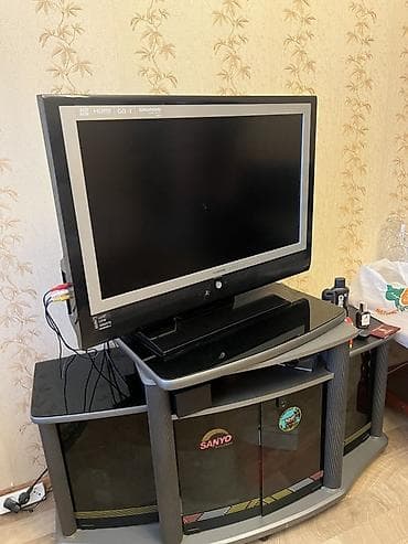 TV altlığı: Grundig LCD televiziya + SANYO TV altlığı - Televizor: Grundig LCD — 2