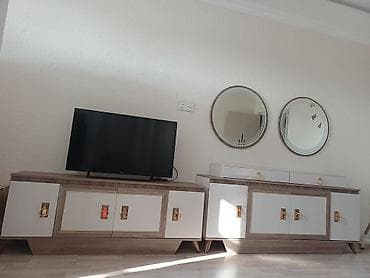 - Komplekt: 1) TV tumbası – mərkəzdə iki qapılı bölmə, sağ-sol — 1