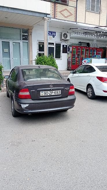opel zapçast: Salam opel Vectra ili 97 mator 2 benzin tecili satılır barter yoxdu — 9