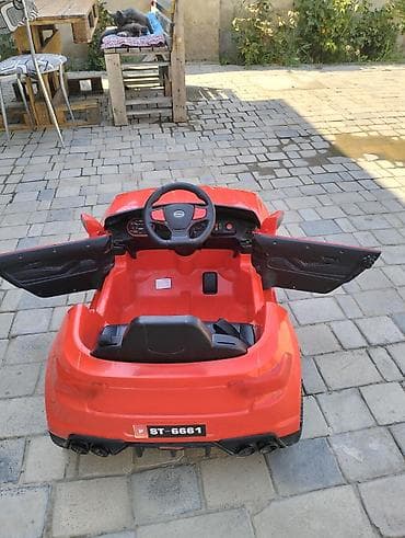 Uşaq elektrikli maşın – qırmızı rəng, açılan iki qapı, sport dizayn — 4