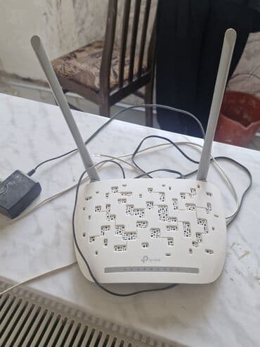 modem outdoor: TP-Link istehsalı olan bu simsiz router, yüksək sürətli internet — 1