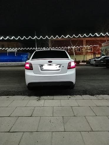 hybrid avtomobillər: Kia Rio: 1.4 l | 2010 il Sedan — 5