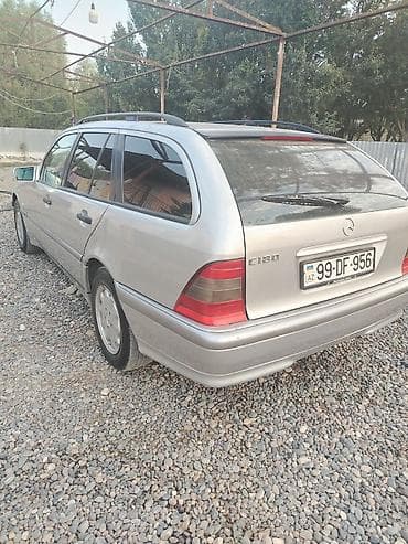 opel astra k: Mercedes-Benz C‑Class Universal (W202) – gümüş rəngli stansiyon vaqon — 7
