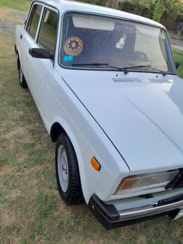 опель зафира а: Lada 2107 sedan – ağ rəng Xüsusiyyətlər: - Kuzov: 4 qapılı sedan, ağ — 6
