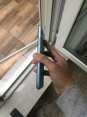 islenmis telefonlar kreditle satisi: Xiaomi 12, 128 GB, rəng - Mavi, 
 Barmaq izi, Face ID — 4