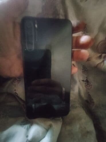 OnePlus: Xiaomi Redmi seriyalı smartfon - Ekran: tam ölçülü çərçivəsiz ekran — 2