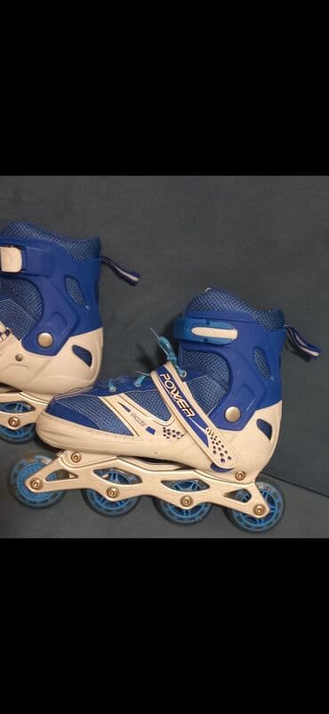 uşaqlar üçün tekerli krosovkalar: Mavi və ağ rənglərdə olan bu təkərli konkisürənlər həm görünüş, həm də — 2