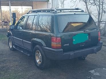 masin cip: Jeep Grand Cherokee: 4 l | 1994 il 280000 km Ofrouder/SUV — 5