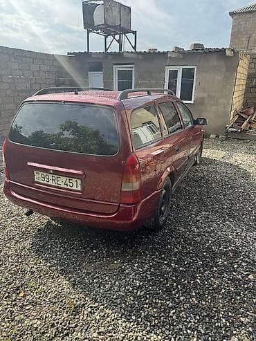 Opel: Opel Astra Caravan (Universal), qırmızı gövdə yalnız kredetlə — 7