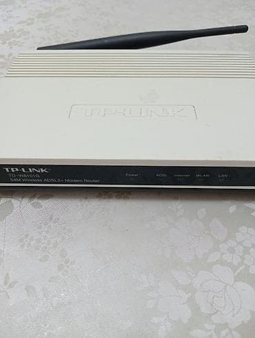 TP-LINK TD-W8101G – 54Mbps Wireless G ADSL2+ Modem Router lalafo.az -da TP-LINK TD-W8101G – 54Mbps Wireless G ADSL2+ Modem Router