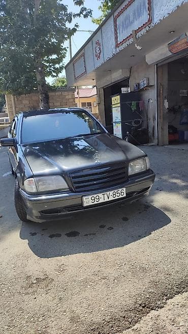 7 nəfərlik avtomobillər: Mercedes-Benz C-Class: 2 l | 1994 il Sedan — 1