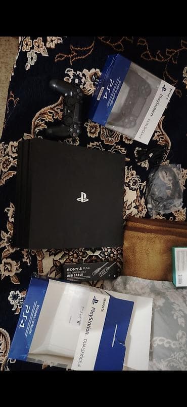PlayStation 4 Pro komplekti Məhsulun tərkibi: - Sony PlayStation 4