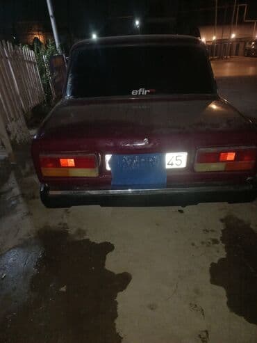 badamdar maşın bazarı ünvan: VAZ 2107, al-qırmızı rəngdə klassik sedan. Xüsusiyyətlər: - Kuzov: 4 — 4