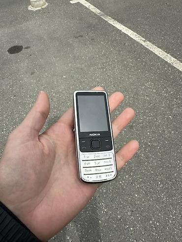 nokia 638: Nokia 6700 Slide, rəng - Gümüşü, Düyməli — 1