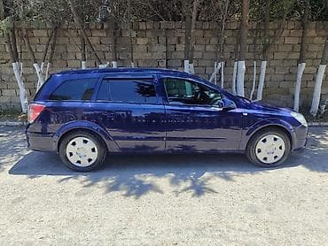 13 disk: Opel Astra Caravan (Universal) – mavi rəng - Kuzov: universal — 5