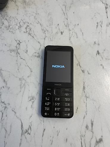 telefon zengi: Nokia 1, 4 GB, rəng - Qara, Düyməli — 2
