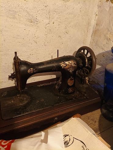 Antik Singer tikiş maşını - Brend və model: The Singer Mfg. Co. –