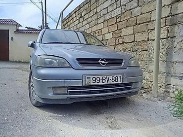 Opel Astra Caravan (universal) – gümüşü rəng - Kuzov: 5 qapı