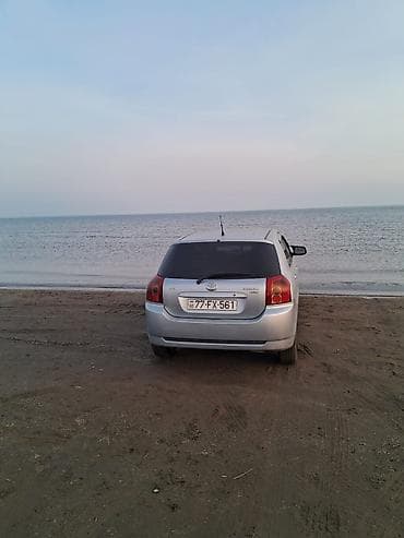 maşın satış: Toyota Corolla (hatchback), gümüşü rəng. - Kuzov: 5 qapılı hatchback — 4