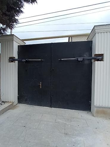Qapı ustası xidmətləri: Doqqaz Avtomatik qapi qollari Azerbaycandaki her cure agir darvazalara — 8