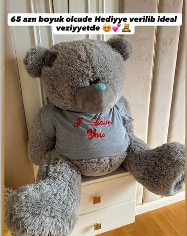 i̇nək yumşaq oyuncaqlar: Böyük ölçülü boz rəngli yumşaq ayı oyuncaq. Oyuncağın üzərində "I Love — 1