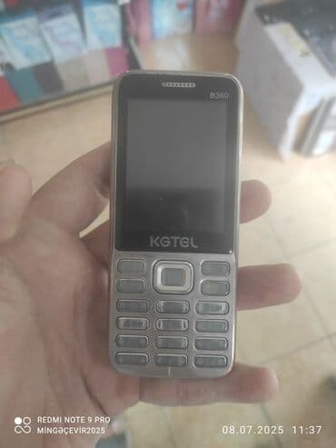 телефон fly ezzy 9: KGTEL markalı, B380 model, boz rəngli düyməli telefon. Bu telefon həm — 1
