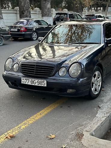 Su nəqliyyatı: Mercedes-Benz E 220: 2.2 l | 2001 il Sedan — 1