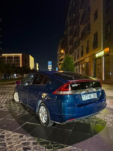 Honda Insight: 1.3 л | 2013 г. Седан — 5
