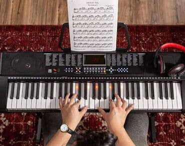 uşaq ucun qulaqlıq: Yeni öyrənənlər üçün. 5 oktava, 61 klaviş 255 cür səs tonları 255 — 3