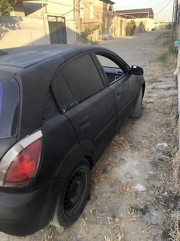 авто руль: Kia Rio: 1.6 л | 2007 г. Хэтчбэк — 4