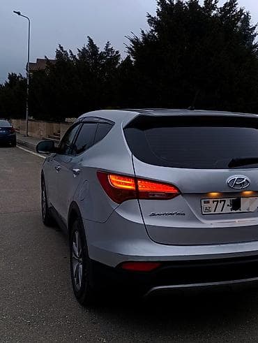 radiator opel astra: Hyundai Santa Fe: 2 l | 2015 il Krossover — 4