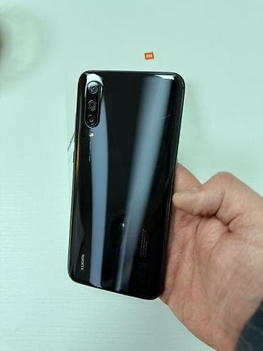 a 10 s: Xiaomi Mi 9 Lite, 64 ГБ, 
 Сенсорный, Отпечаток пальца, Две SIM карты — 3