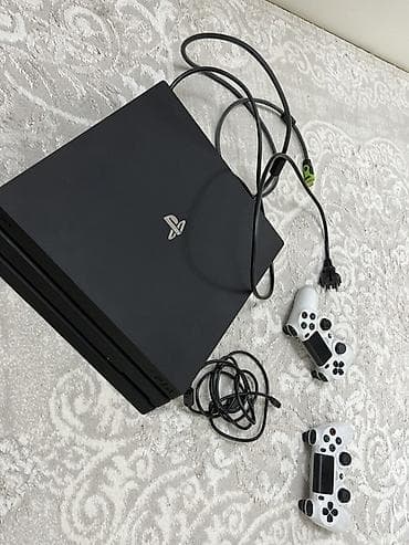 PlayStation 4 Pro 1TB – İdeal vəziyyətdə + 2 Orijinal Pult Elan
