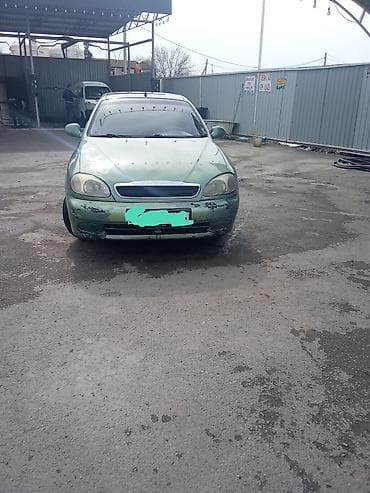 mersedes yan guzguler: Daewoo Lanos: 1.3 l | 2009 il Sedan — 1