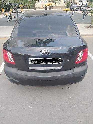 Avtomobil satışı: Kia Rio sedan – qara rəng, kompakt və qənaətcil şəhər avtomobili — 10