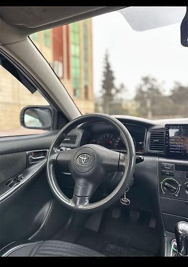 traktor belarus 892: Toyota carolla 2005 sedan salonu – orijinal, funksional və səliqəli — 4