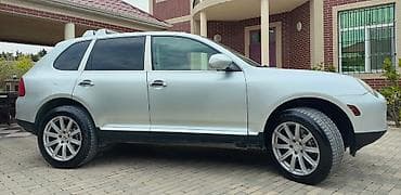 mitsubishi lancer evolution: Porsche Cayenne (1-ci nəsil) – gümüşü rəngdə premium SUV. İli 2008 — 5