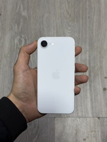 Видеоигры и приставки: IPhone 16e, 128 ГБ, White Titanium, Беспроводная зарядка, Face ID — 1