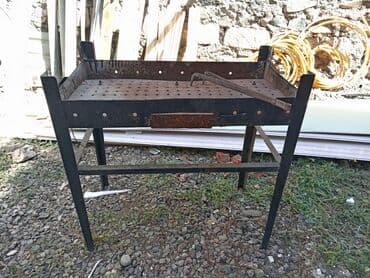 купить угли для мангала: Metal manqal möhkəm konstruksiyaya və geniş bişirmə səthinə malikdir — 1