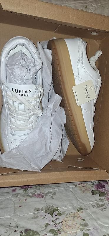 muncuqdan canta: Məhsul: Lufian unisex idman ayaqqabısı Misirdə istehsal olunmuşdur. - — 1