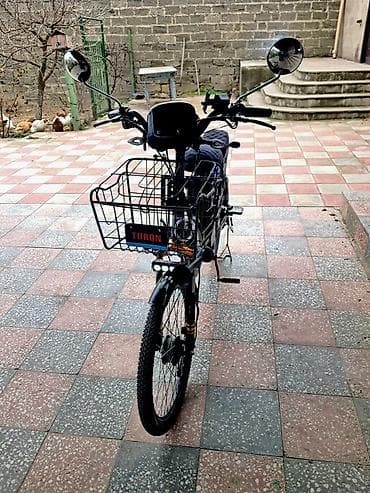 top.az velosiped: TURON elektrik velosipedi merdakandadır 24luk 40ilə. gedir 25klometr — 8