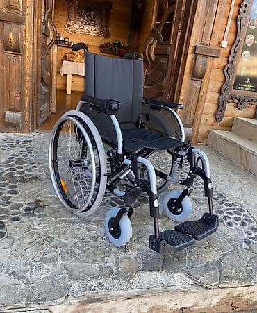 Ottobock əlil arabası - Brend: Ottobock (arxada loqo) - Tip